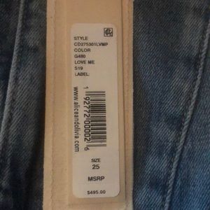 Alice and Olivia denim zip up jumpsuit. Brand new with tags size 25